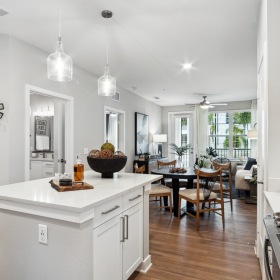 Kitchen open concept kitchen with island at Bainbridge Mission Pointe in Orlando, FL