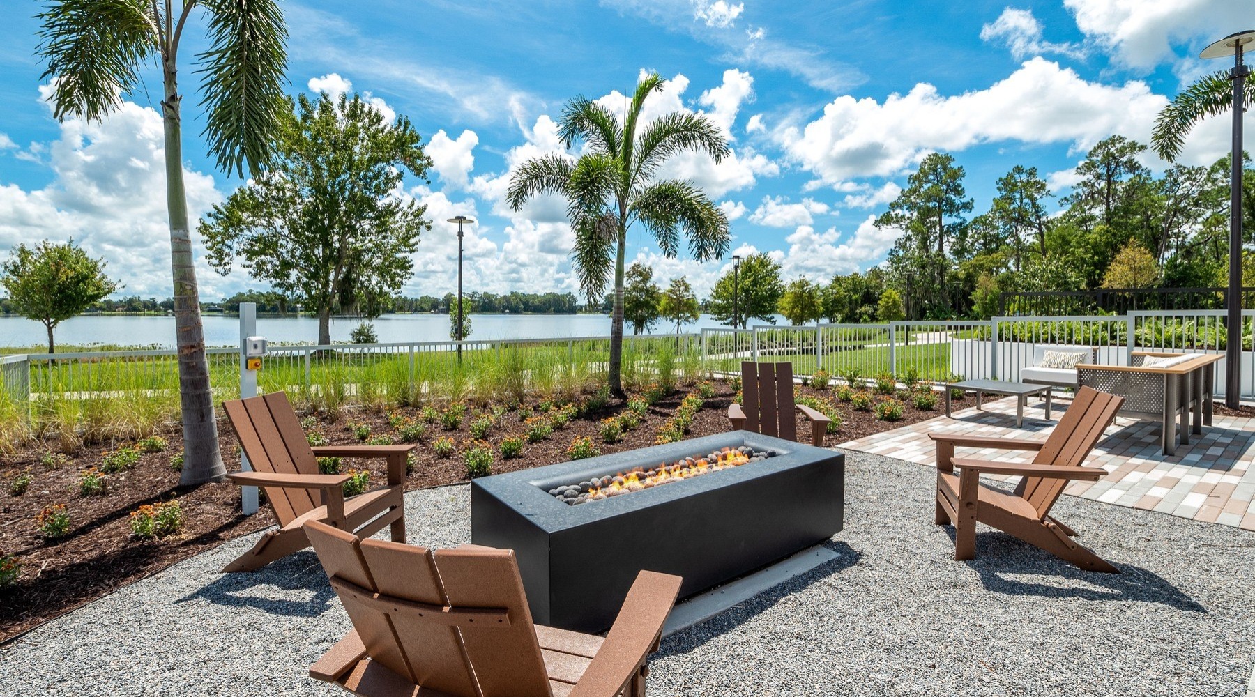 a fire pit near the water