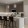 pendant lighting over kitchen island with bar stools